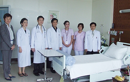 Hospital Director Dr. Pichit Kangwolkij (right) and a team of doctors announce the soon to be open IMCU. 
