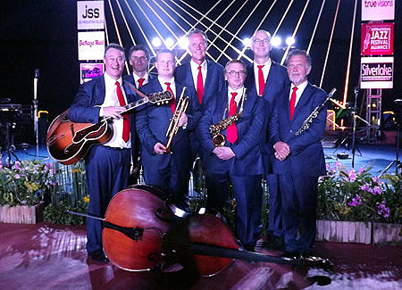The Dutch Swing College Band pose for a group photo at the conclusion of the concert.