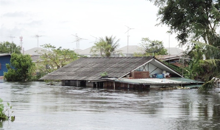 Flood waters up to the rooftops in Ayuthaya.