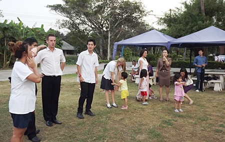 Sangjin and Jasmine make new friends at the HRH Princess Maha Chakri Sirindhorn Vocational School in Banglamung.