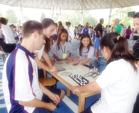 Students and teachers play bingo.