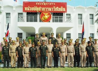 High ranking entourages from both the Thai and Cambodian armed forces pose for a friendly group photo.