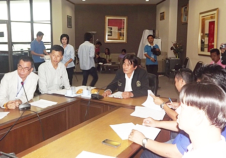 Deputy Mayor Ronakit Ekasingh presides over the planning meeting for a joint task force to increase security citywide. 