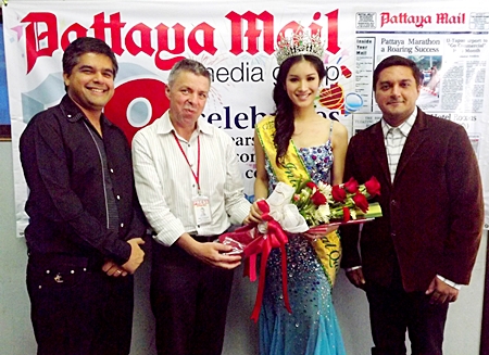 (L to R) Suwanthep Malhotra, Paul Strachan, Sripassorn Athayakorn, and Kamolthep Malhotra exchange pleasantries at the Pattaya Mail offices. 