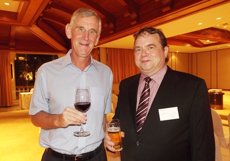 Jerry Stewart (left) gets cooking lessons from Dusit Thani Executive Chef Adrian W. O’Herlihy.
