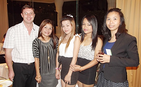 Nigel Quinnell loves to pose with pretty girls.