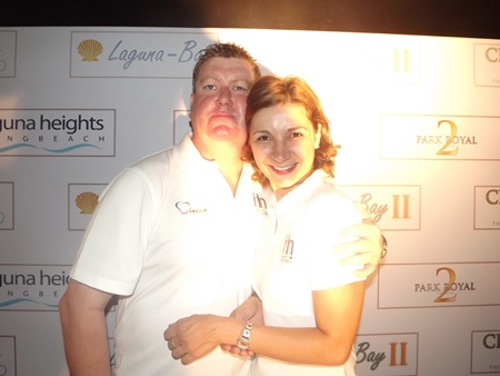 Philip Thompson, sales executive with Heights Holdings, and Katerina Okisheva, sales and marketing coordinator for The Peak Towers get up close and personal on stage.