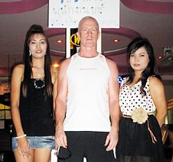Marty Rock (center) after scoring 44 points poses with Ket and Popeye at Siam Cats.