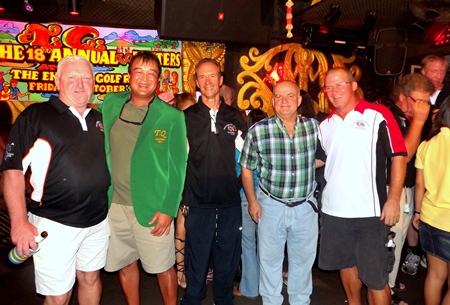 2011 Green Jacket winner Kris Kritsanajootha (2nd left) receives the congratulations of Steve, Woody, Mike and John.
