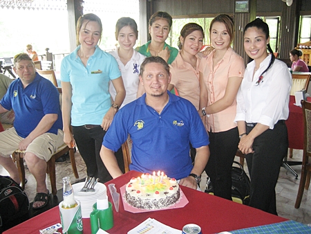 Birthday boy Dannie celebrates with the staff at Emerald. 