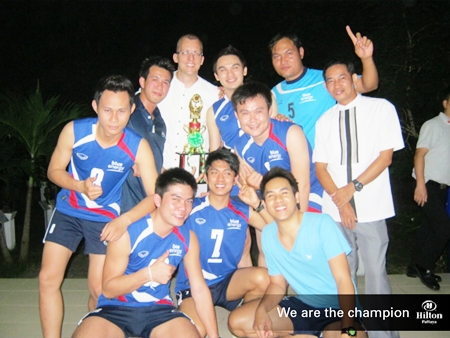 Harald Feurstein, General Manager of Hilton Pattaya (standing 3rd left) poses for a photo with the victorious Hilton Pattaya male volleyball team. 