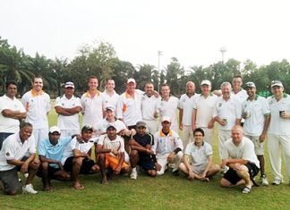 Pattaya Cricket Club and Siam C.C. players pose for a group photo at the Horseshoe Point ground in Pattaya, Saturday, November 12.