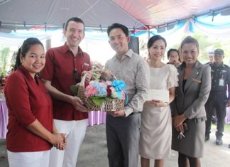 Michael Delargy (2nd left), GM of the Sheraton Pattaya Resort, together with Rojjana Franzke (left), executive assistant manager and Penpapasorn Eamsa-ard (right), senior sales manager presents a gift to Mayor Itthiphol Kunplome and his wife Rachada Chatikavanij (2nd right) on the occasion of his birthday which was celebrated at his home earlier this month.