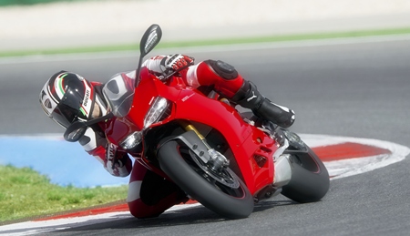 Knee down on the Ducati. 