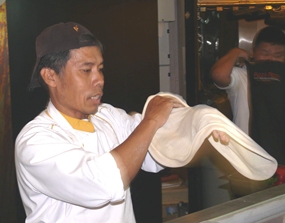 Pizza making at Pizza Pizza.