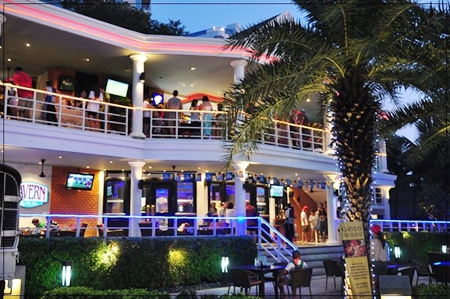 Guests enjoy evening refreshments at Tavern by the Sea.