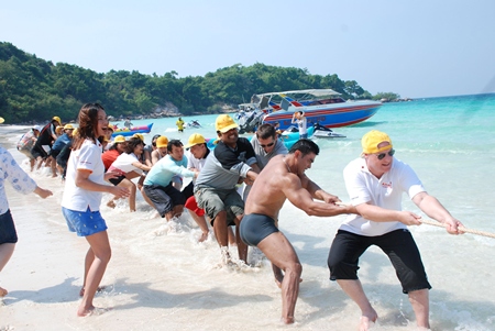 David Cumming leads his team in the tug-of-war challenge.