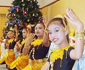 Pattaya Orphanage dancers perform traditional Thai dances.