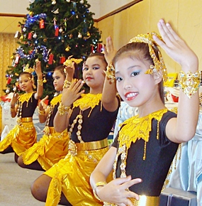 Pattaya Orphanage dancers perform traditional Thai dances.