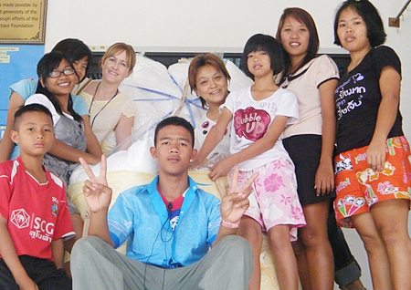 Niamh presents one hundred and thirty pillows to the Children’s Home. 