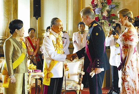 His Majesty the King is congratulated by Belgian Crown Prince Philippe and Crown Princess Mathilde,  as HM Queen Sirikit looks on at the Ananda Samakhom Throne Hall in Bangkok Monday, June 12, 2006.