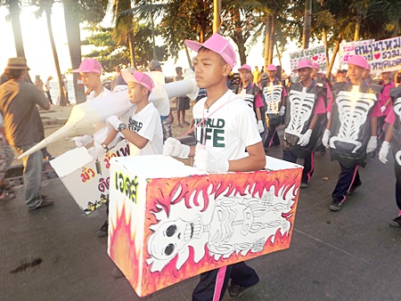 Students from local schools are being taught early, and show their knowledge with homemade signs, props and costumes.