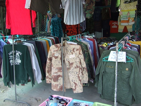 Second hand winter jackets, selling for 35 baht or 3 for 100 baht, are flying off the racks. 