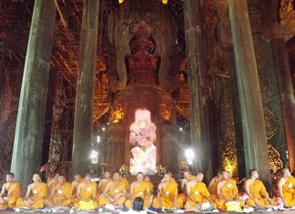 More than 100 monks gather at the Sanctuary of Truth for a religious ceremony to celebrate HM the King’s birthday.
