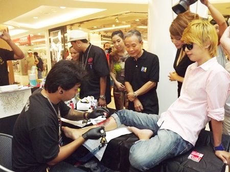 One of the brave souls were inked at the fair.