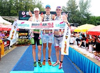 2011 Ironman 70.3 Asia-Pacific Championship winner Michael Raelert of Germany on the podium at Laguna Phuket with runner-up Richie Cunningham (left) and third-placed Paul Matthews (right), both of Australia.