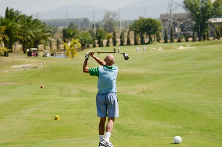 Mr. Len sends the ball on its way at Pattana Golf Resort.
