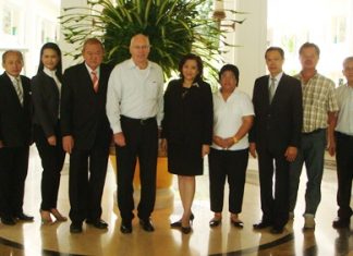 The working group poses for a photo at the Dusit Thani Pattaya following their meeting to discuss preparations for the 2012 PTT Pattaya Open tennis tournament.