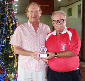 Peter Hammond (left) receives the 2011 Xmas Fayre Trophy from Dave Richardson.