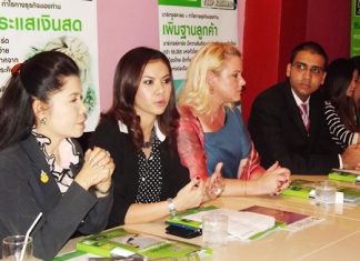 The Barter Card team, with leader Raevadee Wattanurak (2nd left) addresses potential new subscribers at their press conference Dec. 8.