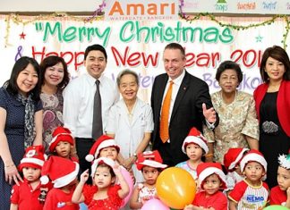 Yutthachai Charanachitta (3rd left), president & CEO of Amari Estates Co., Ltd., together with Pierre Andre Pelletier (3rd right), GM of Amari Watergate Bangkok and the hotel’s management team recently celebrated a Christmas & Happy New Year party with orphans at the Thai Red Cross Children’s Home. The kind hearted hoteliers hosted lunch and brought lots of presents for the kids. Others in the team included Wanna Charoenchaimongkol, director of finance, Chatrapee Kantariyo, executive assistant manager, Assoc. Professor Khunying Saree Chittinand, member of the board of trustees, Surat Kajittanon, head of Home Office and Nichaya Chaivisuth, director of communications & PR.