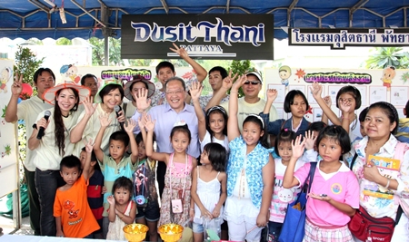 Dusit Thani Pattaya management, led by general manager Chatchawal Supachayanont (centre), joined other hotels and business establishments in front of Pattaya City Hall celebrating National Children’s Day on January 14. Children, accompanied by their families, participated in fun games and activities and enjoyed some kiddie snacks provided by the five-star hotel. The resort staff and management also gave away school supplies and other presents to the children who spent the day winning prizes during fun contests at the resort’s booth.