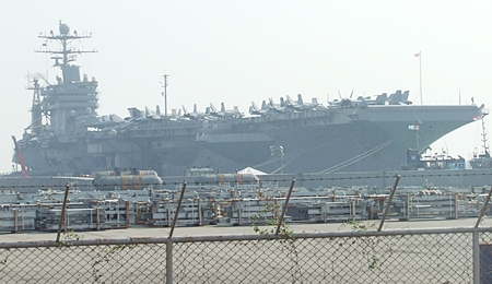 USS Abraham Lincoln aircraft carrier tied up at Laem Chabang Port.