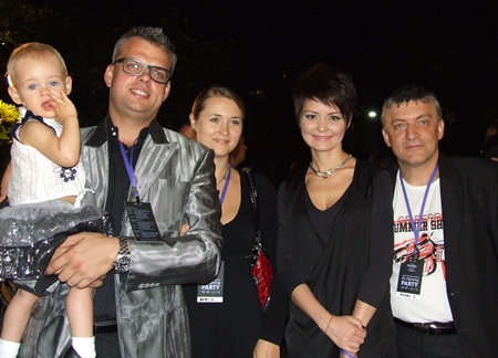 Celebrations for the whole family. (l-r) Andrey Snetkov, marketing and contracting director, TEZTOUR holding his daughter Polina, Natalia Panova, director of Finance, TEZTOUR , Elena Iljina, director of sales and marketing, Ilves Tour and Michel Iljin, group general manager, Ilves tour.