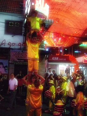Chinese acrobats thrill the crowds on Walking Street.