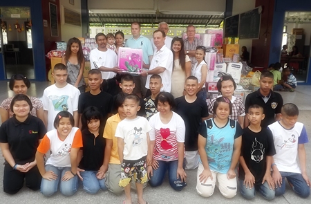 Blind students receive a great donation on their day.