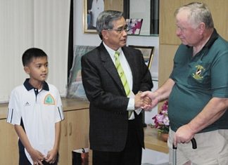 CEO of the Prostheses Foundation excepting the 46th SFCA’s donations. (L to R) Young Marines Bret Mays, Secretary General Therdchai Jivacate, MD and Reed Johnson, CEO of 46th SFCA.