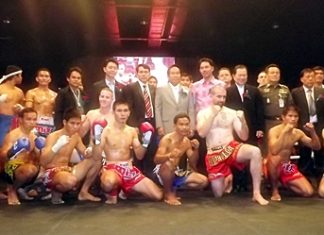 Muay Thai fighters pose with officials and dignitaries, including Pol. Gen. Boonlert Kaewprasert, President of International Boxing Association of Thailand, and Ithipol Kunplume, Mayor of Pattaya City, at the official opening of Pattaya Boxing World on December 23.
