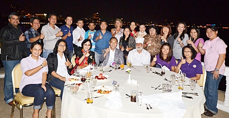 Nopporn Kanchanamanee, (standing, 4th left) District Sales Manager of Thai Airways International hosted a New Year party at the Dusit Thani Pattaya recently to say thank you to the leading travel agents on the Eastern Seaboard. 