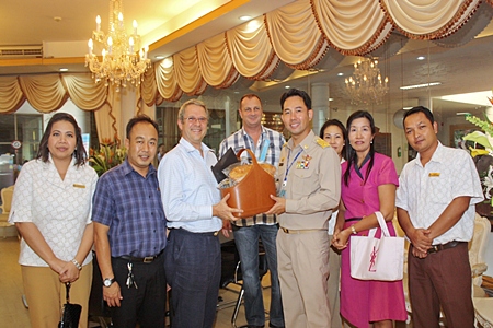 Andre Brulhart (3rd left), GM of Centara Grand Mirage Beach Resort Pattaya together with his management team paid a courtesy call on Pattaya Mayor Itthiphol Kunplome (3rd right) at city hall recently to wish him a Happy and Prosperous New Year. The team included (l-r) Daranat Nuchaikaew, Director of Human Resources, Thanathip Vihokhern, Chief Engineer, Sukanya Wongdornma, Financial Controller and Jeerasak Koisman, front office manager.