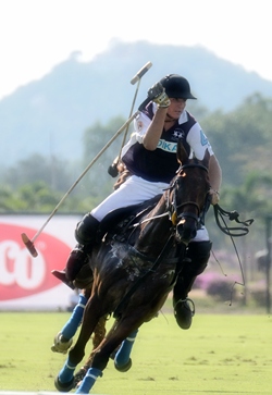 Troika chase the ball downfield in the playoff match against Royal Pahang.