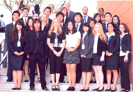 Students and delegates pose for a group photo at the Model United Nations Conference, Bangkok. 