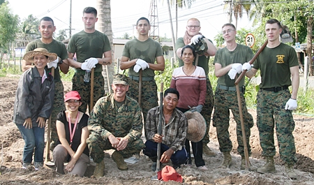 Working the land on the Father Ray Farm.