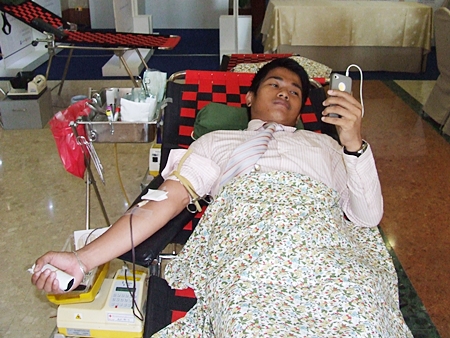 Listening to music is a good way to pass the time while donating blood. 