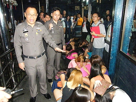 Regional 2 Superintendent Lt. Gen. Punya Maamen (front, left), along with regional police and Children’s Welfare and Protection Center officers inside the Silver Star A-Go-Go.