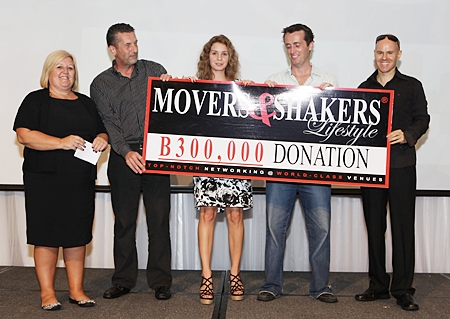 A cash amount of baht 300,000 was given to the Lighthouse Club by Cees Cuijpers (2nd left), organizer of Movers & Shakers. Also shown (left to right) are Tracy Cosgrove, (Cees Cuijpers), Irina Breslavtseva, marketing manager for Heights Holdings, Stuart Maxwell Foulkes, LHC treasurer and Neo Lothongkum, LHC PR & Media.
